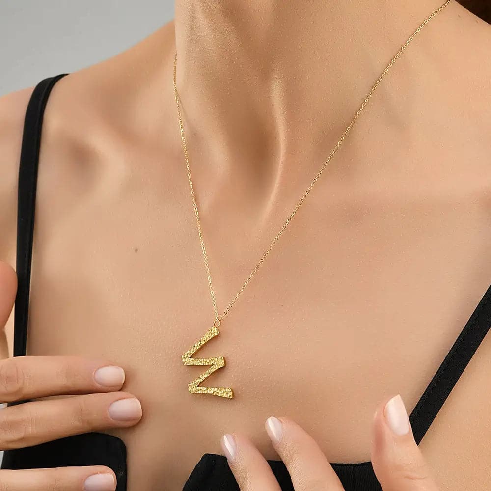 Ropi Letter-W Halskette Gold