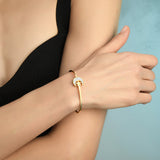 Hogo Armreif Gold