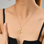 Ropi Letter-N Halskette Gold